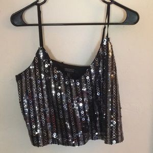 Black, spaghetti strap sequenced top. Sparkly top.